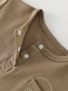 Toddler boys long sleeve brown cotton polo shirt with white buttons and button collar