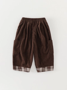 Deep brown corduroy pants for kids with elastic waist and stylish plaid hem details