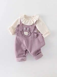 Baby girl autumn set with ruffle long sleeve top and purple corduroy overalls featuring a bunny
