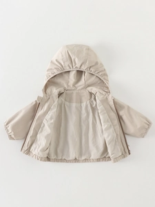 Minimalistische beige Kinderkapuzenjacke mit Reißverschluss und elastischen Bündchen für Herbst