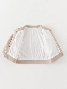 Beige waffle knit cardigan for toddlers with soft cotton lining and ribbed cuffs