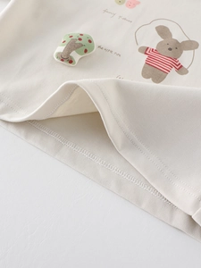 Girl's long-sleeve cream top with cute cartoon rabbit print and textured mushroom patch