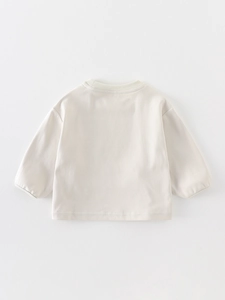 Girl's cream cotton long sleeve T-shirt with a round neck and minimalist back view design