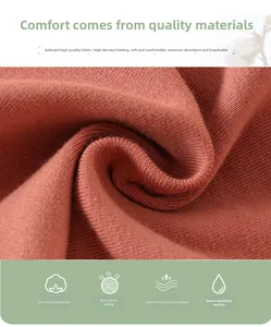 Close-up of ribbed knit cotton fabric in rust red for baby floral rompers