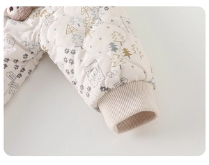 Detail of ribbed cuffs on thickened quilted baby winter romper with forest bear prints