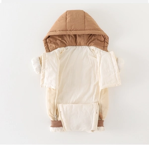 Detail view of baby hooded winter romper with dual zippers and warm quilted lining