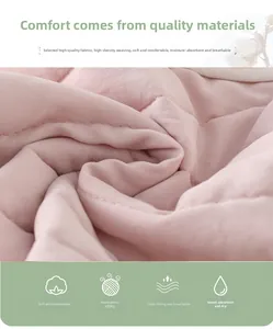Detailed view of soft pink quilted fabric for warm autumn baby rompers and clothing