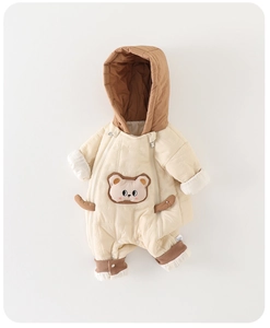 Detail of baby quilted romper with 3D teddy bear and soft fleece lining for winter warmth