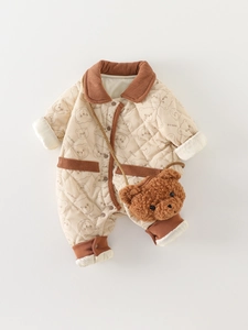 Quilted baby romper with bear print and corduroy trim, including matching plush bag