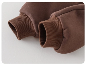 Close-up of thick cotton thermal sleeve cuffs with ribbed design for boys winter jacket