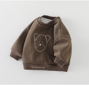 Detail of baby's dark brown fleece sweatshirt with a bear print and Bowwow text design