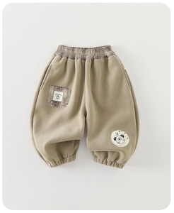 Detail view of children's khaki joggers with plaid pocket and cute panda patch design