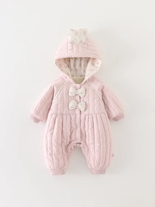 Pink quilted baby romper with floral hood lining and bow details for infant warmth