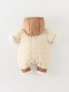 Quilted warm winter baby romper with brown hood and dual-zipper design in cream white