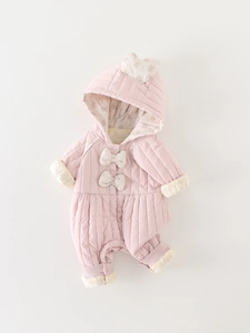 Pink quilted baby romper with floral hood and bow accents for infant girls
