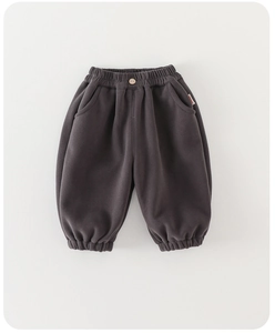 Detail view of charcoal grey toddler jogger pants with elastic waist and soft cotton texture