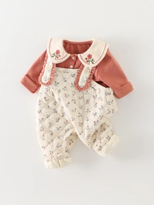 Winter floral baby romper with cherry embroidered Peter Pan collar and quilted straps
