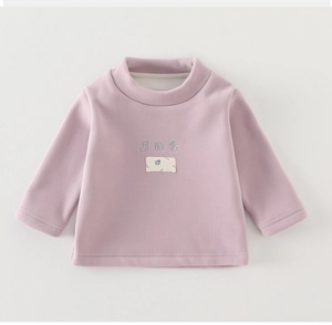 Detail of baby thermal fleece sweatshirt with cute embroidery and floral patch