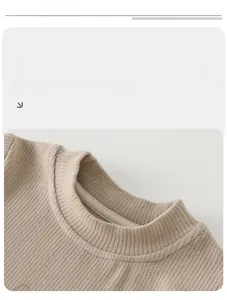Detail view of beige ribbed knit neckline with high elasticity and soft texture