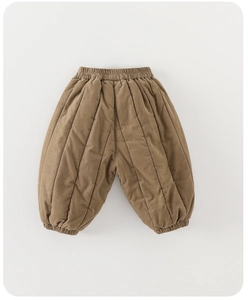 Detail of baby quilted warm pants featuring elastic waistband and vertical stitching texture