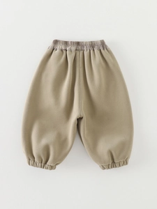 Winter thermal padded trousers for toddler girls in beige with a stylish plaid waistband