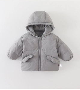 Close-up of baby puffer jacket with animal ear pockets and horizontal quilting details