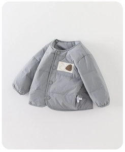 Detail of grey baby quilted down vest with cute chestnut patch and snap button closure