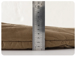 Detailed close-up showing the 8.5cm thickness of brown corduroy padded baby winter pants