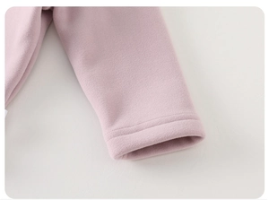 Detail of pink thermal fleece cuff with reinforced double stitching for baby warm top