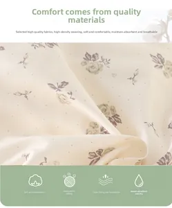 Gros plan sur tissu en coton duveté à fleurs, doux, respirant et anti-boulochage