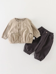 Three-piece beige quilted vest, striped shirt, and grey cotton pants for toddlers