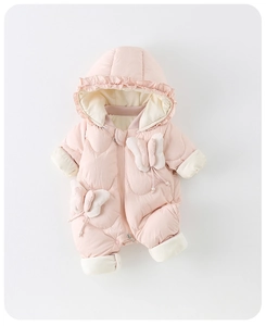 Detail of pink baby snowsuit with 3D white bows, ruffles on hood and warm fleece lining