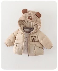 Detail showing plush fleece lining and cute bear-ear hood on baby winter coat