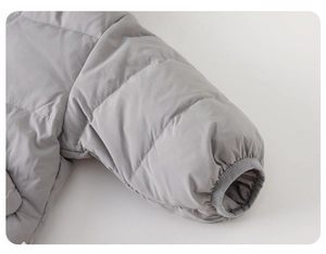 Detail view of baby down jacket featuring elastic windproof cuffs and premium gray fabric