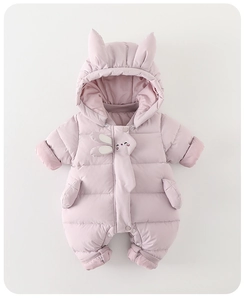 Close-up of pink baby romper showing cute 3D bunny ears and ribbed windproof cuffs