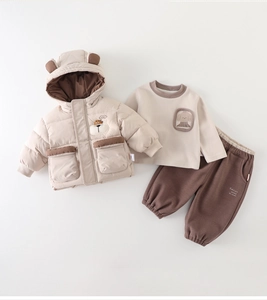 Detail of baby winter 3-piece set featuring bear ear hood and soft cotton fabric