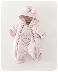 Detail view of pink baby winter romper featuring cute bow hood and warm padded lining