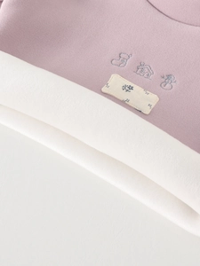Pink fleece baby thermal shirt with soft texture and winter embroidery details