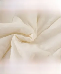 Detail of high-density quilted fabric showing soft texture and breathable weaving