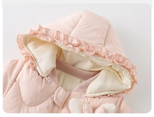 Detail of pink baby puffer jacket with ruffle hood and cozy fleece lining finish