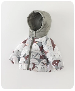 Detail of infant winter hooded jacket featuring cartoon landscape prints and olive green hood