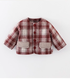 Detail of red and white checkered toddler coat showing woven texture and buttons