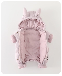Close-up of pink hooded baby romper with dual zippers and cute animal ears detail