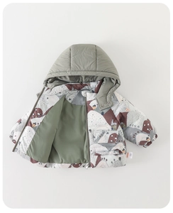 Detail of baby winter padded jacket featuring nordic house prints and olive green lining