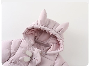 Close-up of baby winter romper featuring cute 3D bunny ears and detailed animal embroidery