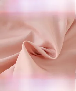Macro detail of pink high-density fabric, soft breathable and anti-pilling material