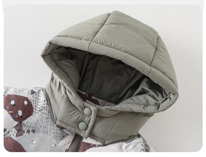 Detail of hooded infant winter jacket with cartoon print and double-button windproof collar
