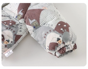 Close-up of elastic cuffs and Nordic animal print on toddler winter cotton jacket