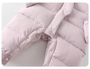 Detail of the snap-button crotch on this quilted baby winter romper for diaper changes