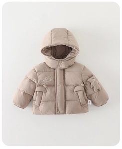 Close-up of baby winter hooded jacket with bear plush charm and house embroidery detail